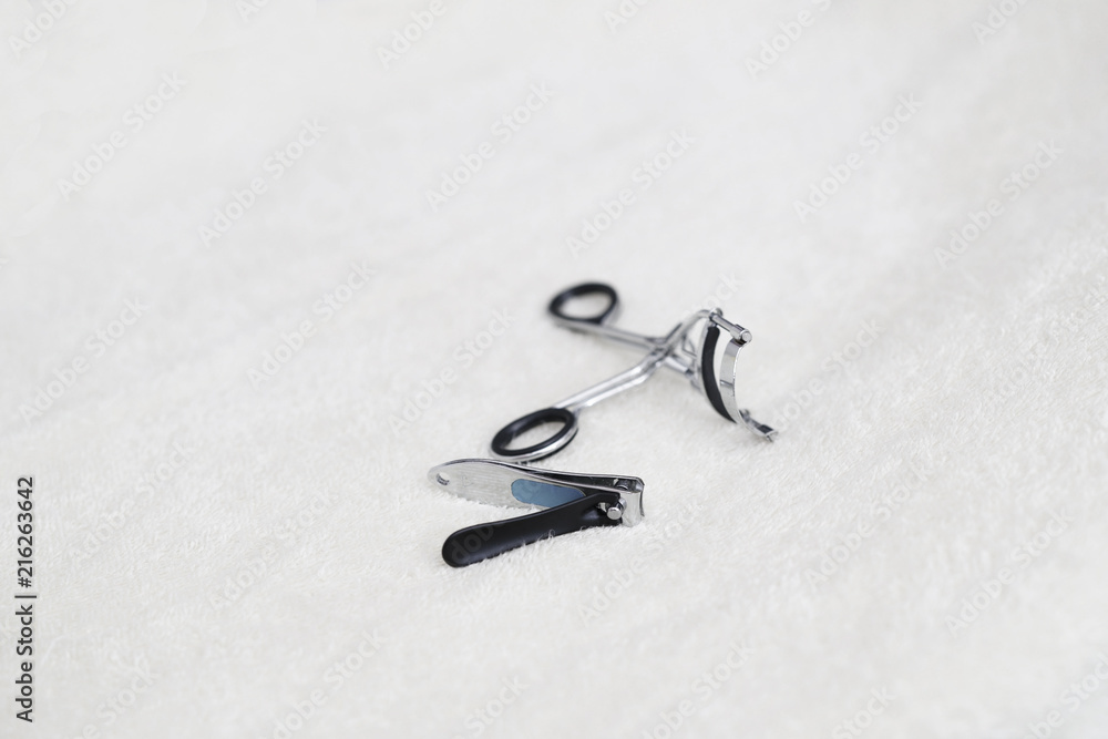 Fototapeta premium Nail cutter and eyelash curler