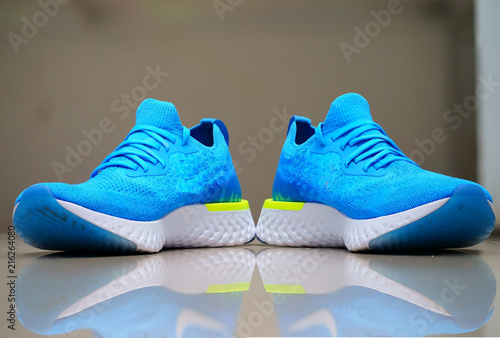 sport or running shoes in display on blur background photo