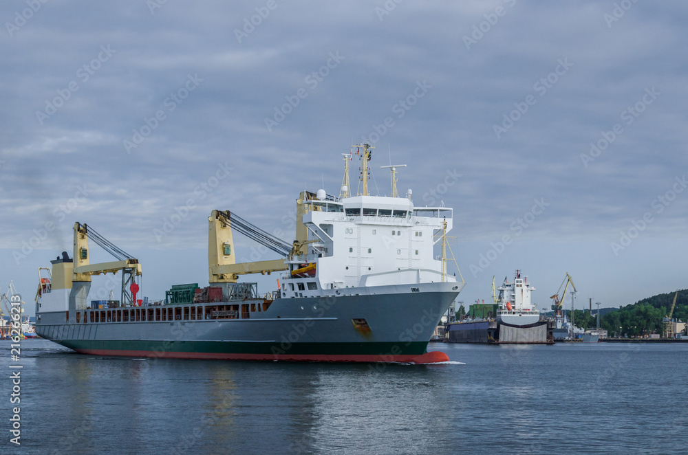MERCHANT VESSEL - Freighter entering the port
