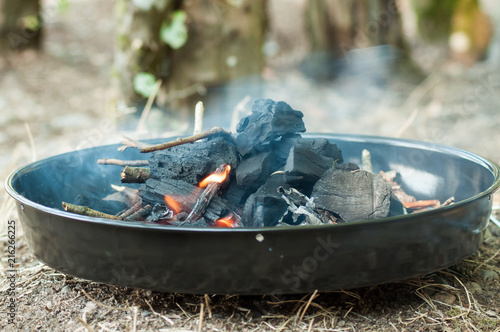 closeup of flames and charcoal.in barbecue