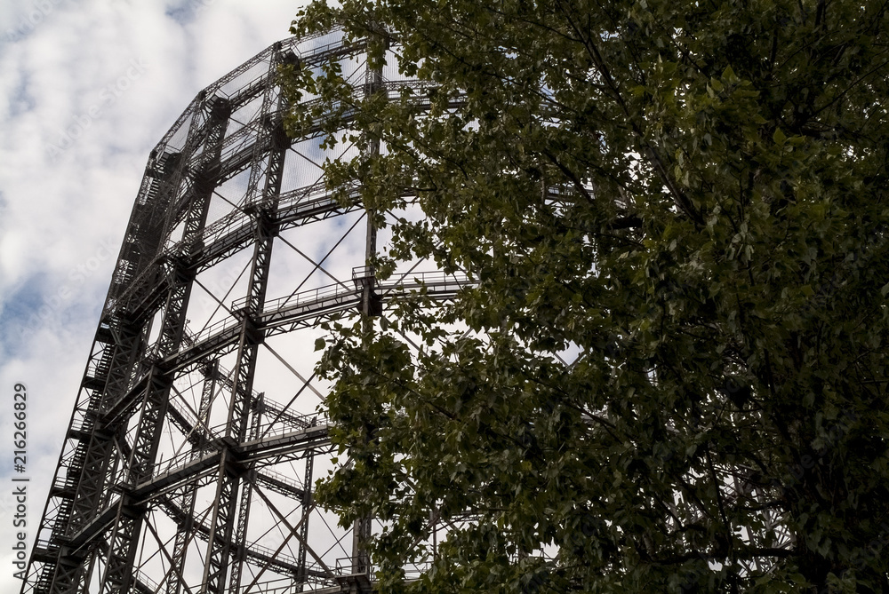 Disused Gasometer framework StockFoto Adobe Stock