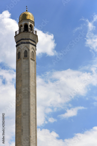 Minaret tall tower an a blue sky