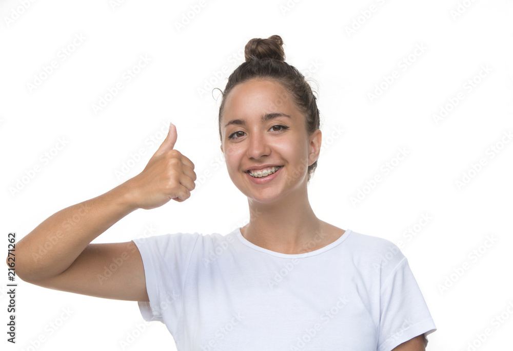 Young happy cheerful woman showing thumb up. Approval, yes, ok, positivity gesture Young happy cheerful woman showing thumb up. Approval, yes, ok, positivity gesture