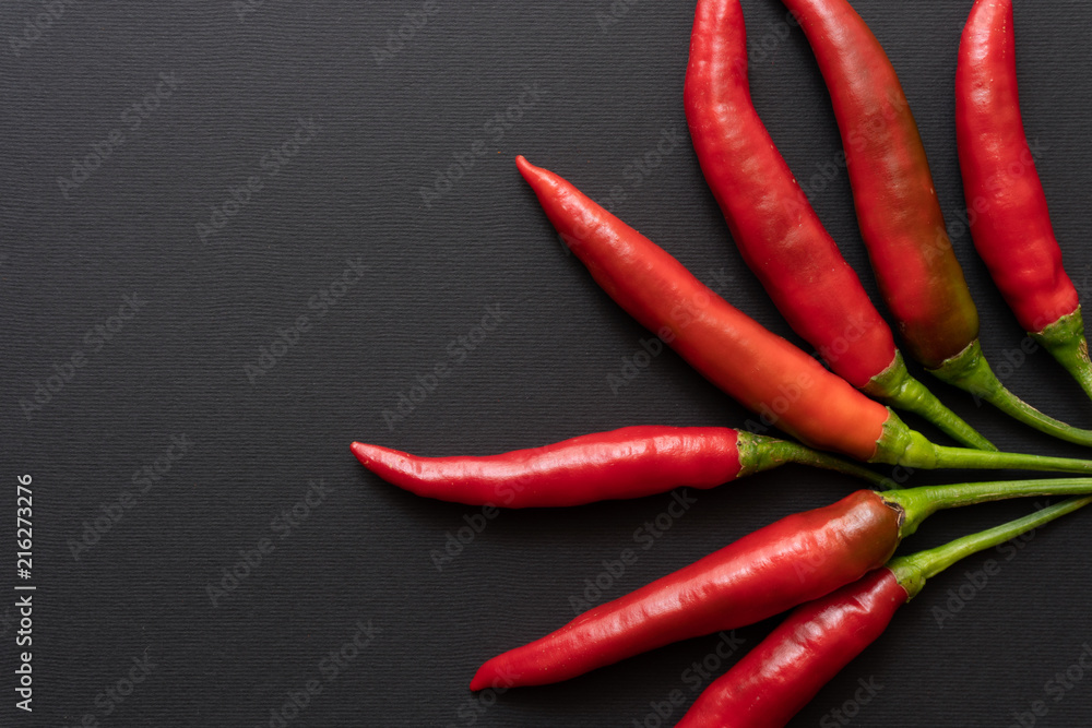 Chili Peppers and black background