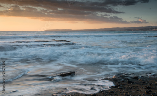 Beautiful dramatic Sunset over a rocky coast © Michalis Palis