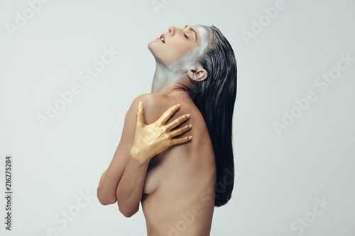 Schilderij op canvas Sensual woman with silver and gold body paint