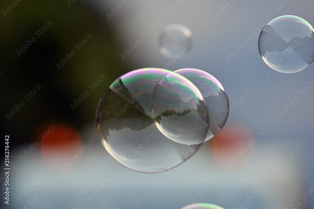 Colorful soap bulbs with reflections of a street scene on the christopher street day 2018 in Berlin-Germany. Colorful soap bulbs with reflections of a street scene on the christopher street day 2018 in Berlin-Germany.
