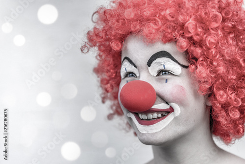 Fototapeta Naklejka Na Ścianę i Meble -  Girl clown face close up vintage style laughing
