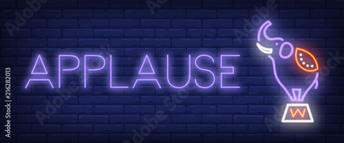 Applause neon style banner. Text and circus elephant on brick background. Night bright advertisement. Can be used for signs, posters, billboards
