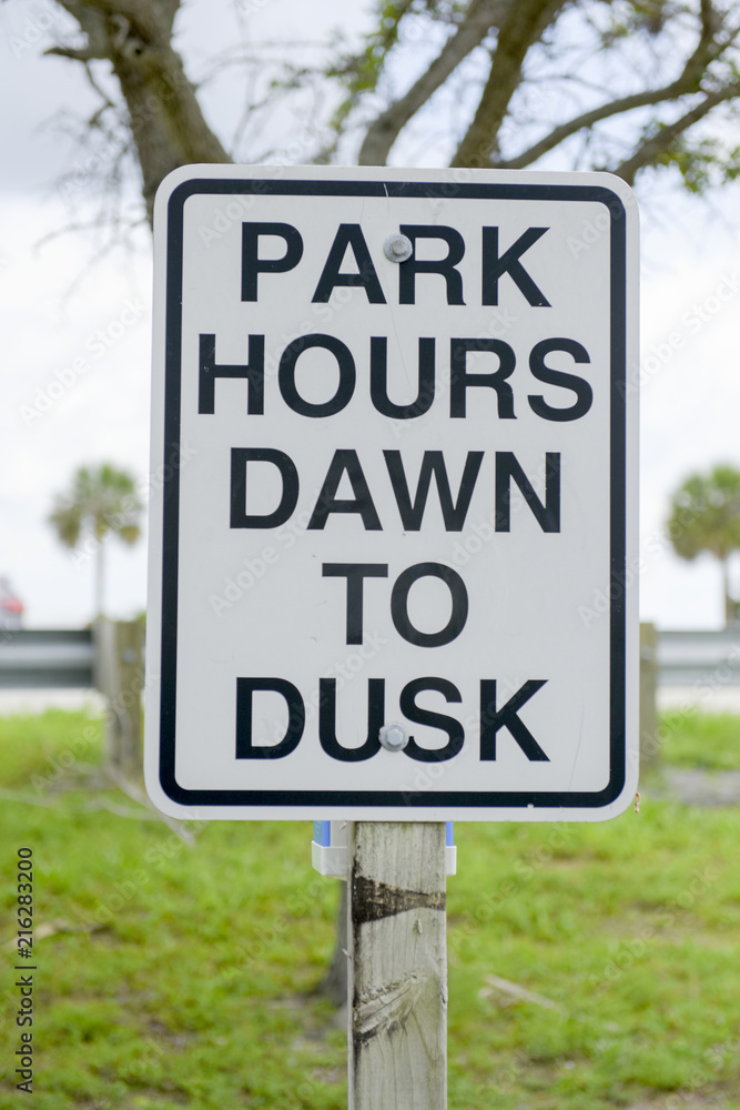 Park hours sign