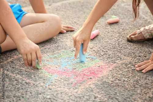 Children drawing with chalk...