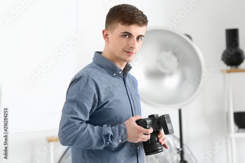 Young male photographer in ...