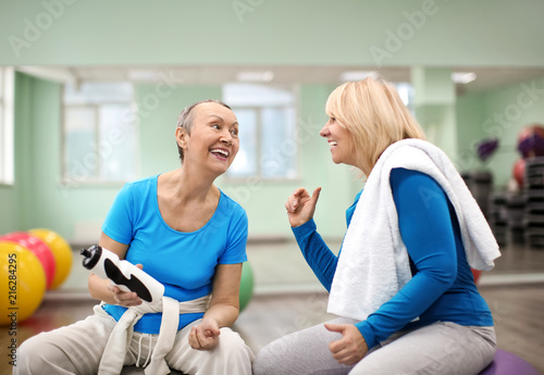 Mature women training in gym