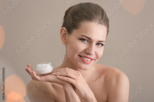 Young woman with jar of han...