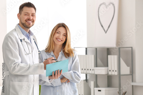 Doctor with female patient ...