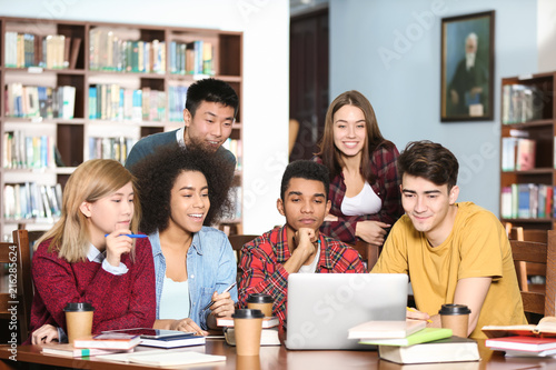 Group of students studying ...