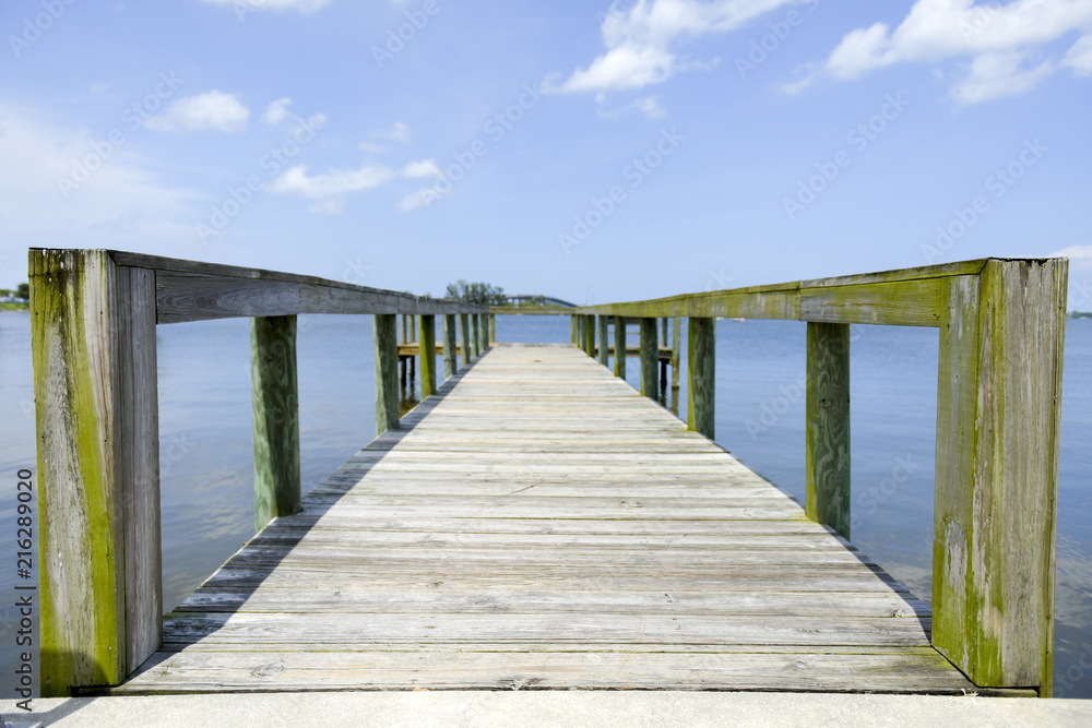 Wooden pier and blue sky Wooden pier and blue sky