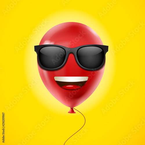 smiling balloon with sunglasses