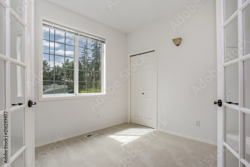 Empty room with pure white walls.