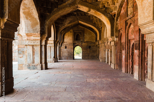 Fotografering Colonnade around a main palace in the Lodhi Garden, Delhi, India