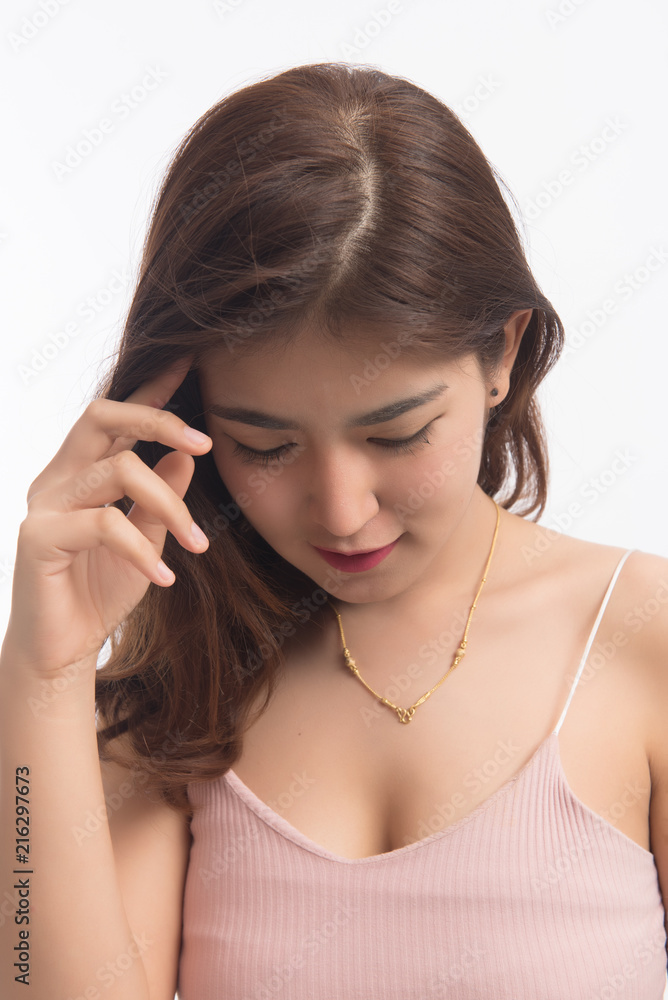 Portrait of a beautiful asian young woman thinking, isolated on white background Portrait of a beautiful asian young woman thinking, isolated on white background