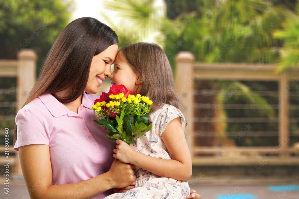Happy Mother and daughter hugging Happy Mother and daughter hugging