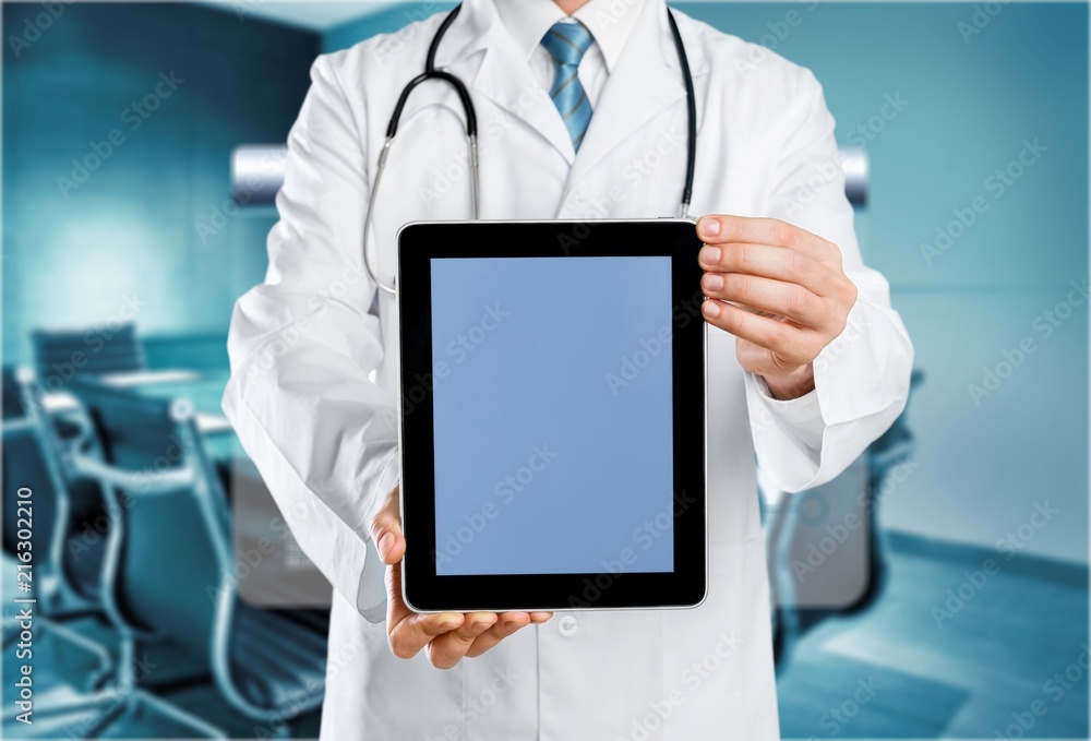 Doctor at hospital working with laptop Doctor at hospital working with laptop