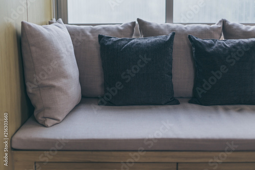 close up of natural color sofa with soft pillow interior concept