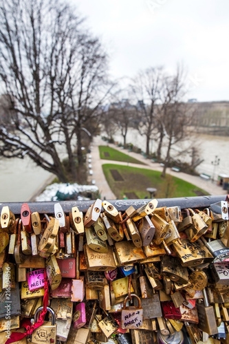 The Seine river and love locks at Pont Neuf in Paris