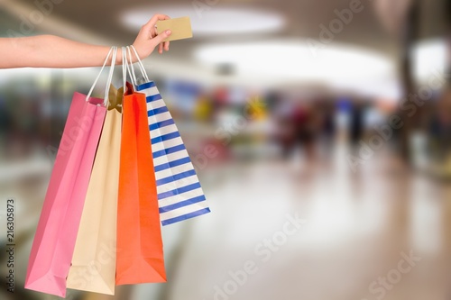 Woman hand with many shopping bag