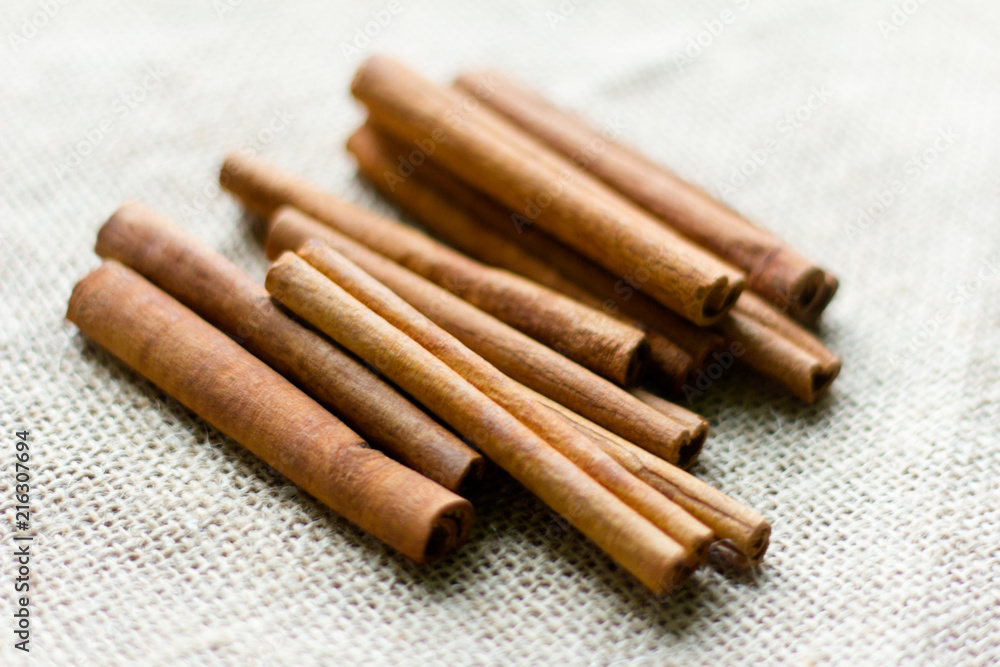 cinnamon sticks on grey background