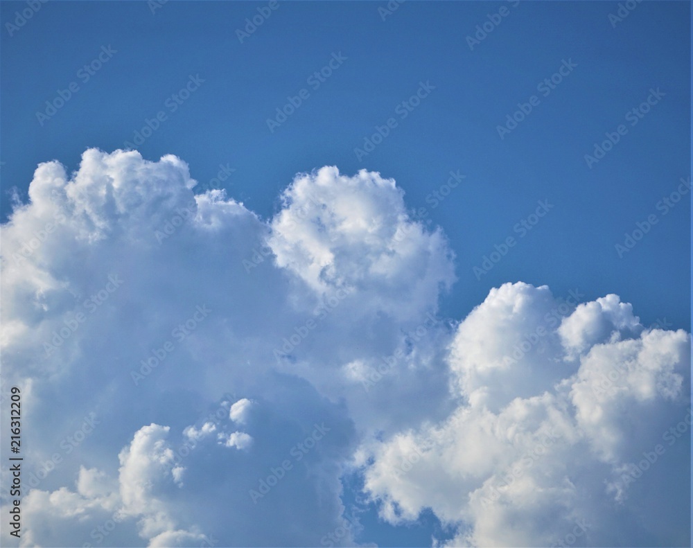 Amazing cumulus clouds and sunlight on the background of clear blue sky, Summer in GA USA. Amazing cumulus clouds and sunlight on the background of clear blue sky, Summer in GA USA.