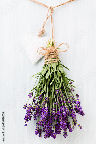 Fototapeta Naklejka Na Ścianę i Meble -  Lavender flowers, bouquet on rustic background, overhead.
