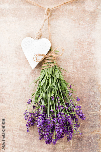 Fototapeta Naklejka Na Ścianę i Meble -  Lavender flowers, bouquet on rustic background, overhead.