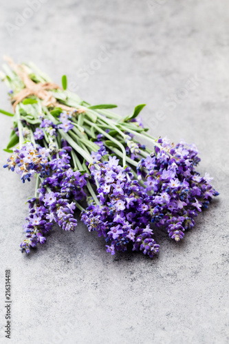 Lavender flowers  bouquet on rustic background  overhead.