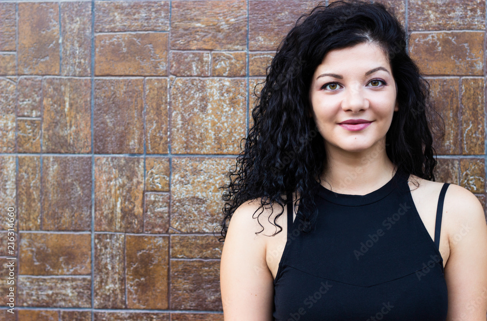 Cheerful young woman outdoors