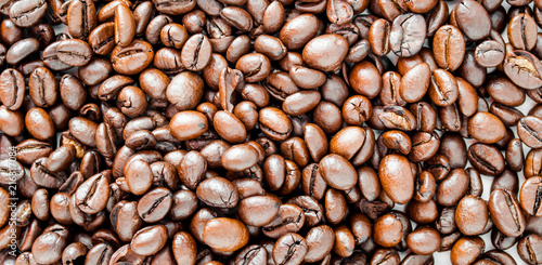 Coffee beans background close-up. Coffee background photo