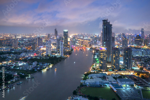 Aerial view of Bangkok modern office buildings, condominium, living place in Bangkok city downtown with sunset scenery, Bangkok is the most populated city in Southeast Asia.Bangkok , Thailand © naruecha