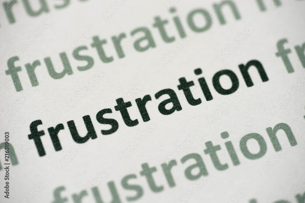 Obraz premium word frustration printed on paper macro