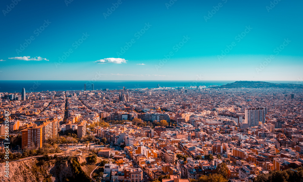 View of Barcelona, the Mediterranean sea. View of the city from the Bunker of Carmel famous viewpoint.Teal and orange look