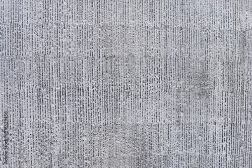 Background of gray concrete with vertical textured