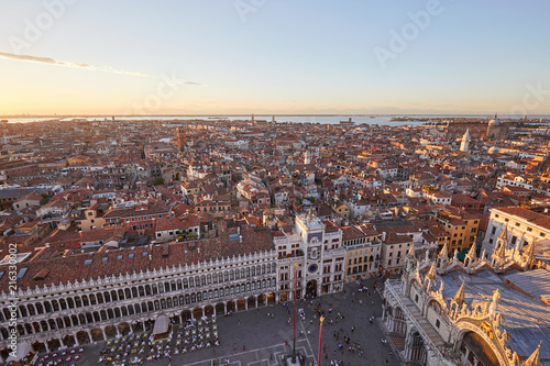 Aerial view of Venice with Saint Mark square, city and horizon at sunset, Italy