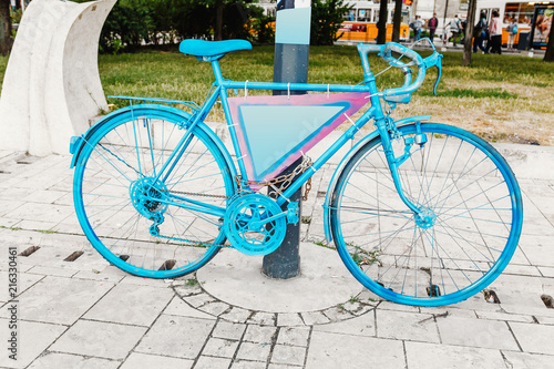 close up of a vintage retro bicycle as decoration for advertising at the city street