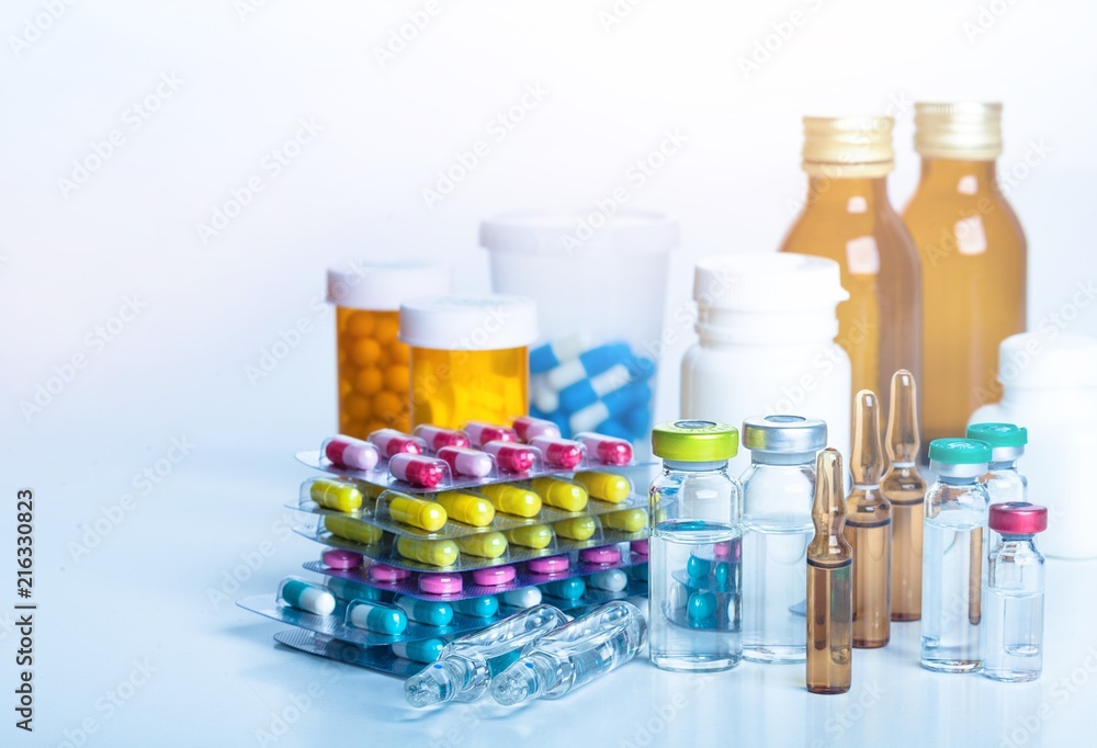 Colorful pills and tablets on background Colorful pills and tablets on background