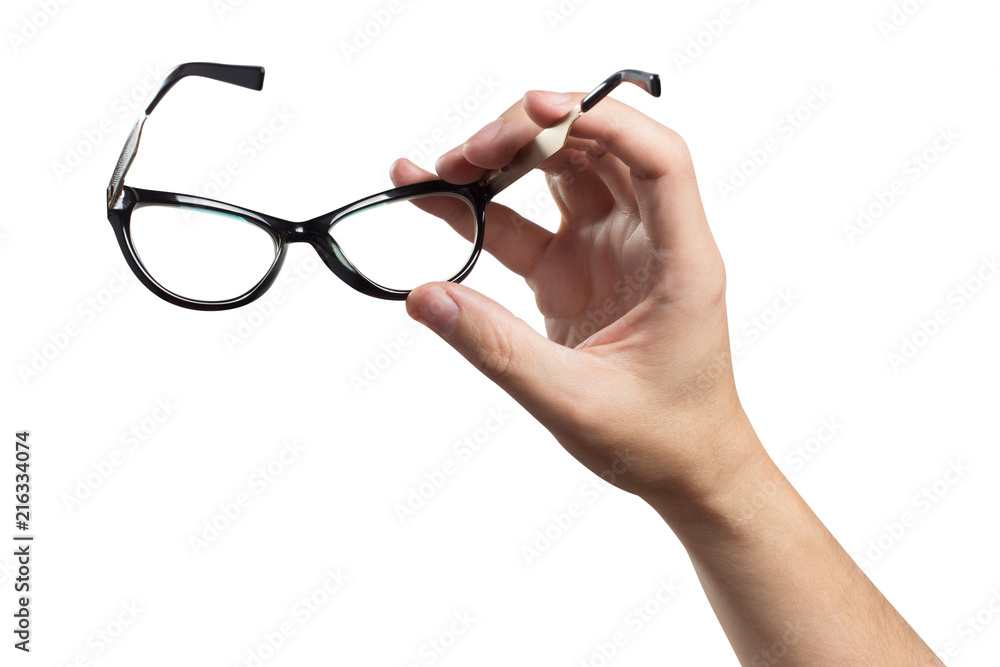 Hand holding plastic black glasses, isolated on white background Hand holding plastic black glasses, isolated on white background