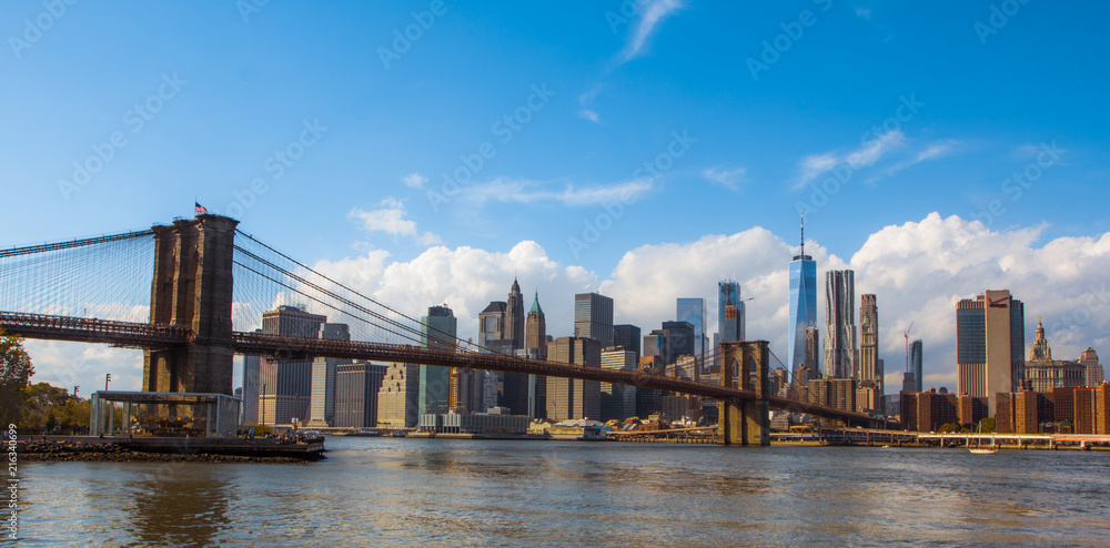 New York autumn skyline from Brookline side with view on the Brooklyn bridge. New York autumn skyline from Brookline side with view on the Brooklyn bridge.