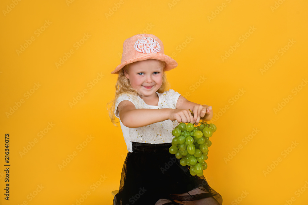 little girl with green wine grapes little girl with green wine grapes