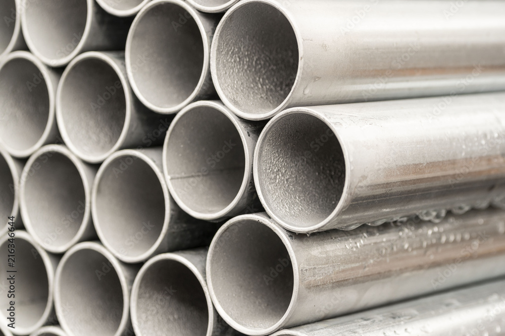 Close - up stack of metal pipe Close - up stack of metal pipe