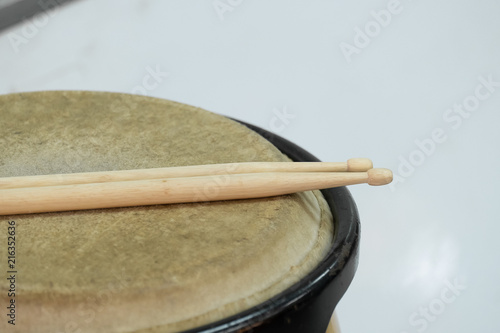 drum and wooden stick
