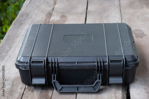 safety black case on wood